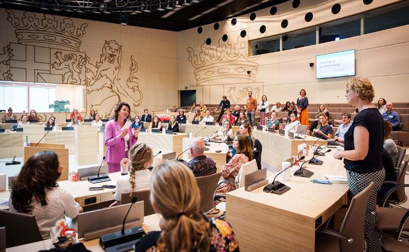 Vakdag zaal met communicatieprofessionals